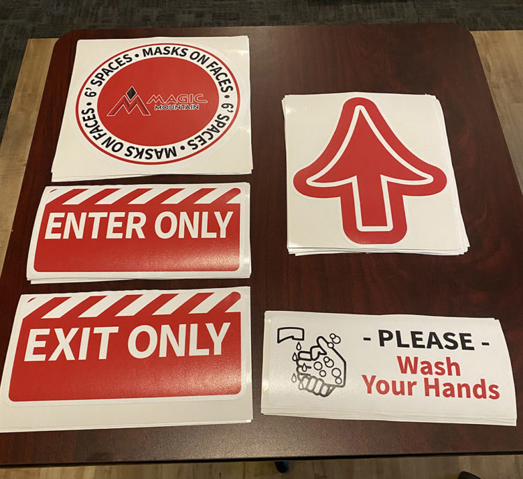 Covid ski area floor signs enter exit and hand washing along with logo facemark sign