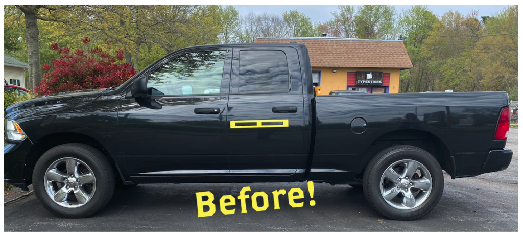 Bland black truck before vehicle wrap application 