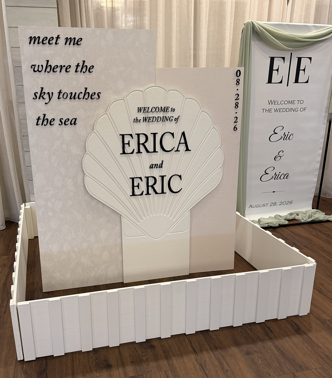 Custom coastal wedding welcome display for a Jersey Shore wedding featuring layered panels, dimensional seashell detail and coordinated event signage