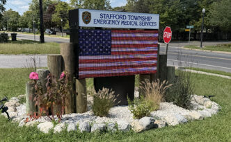 Stafford Township Emergency Medical Services LED message center sign with custom backlit header and American flag display