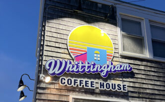 Whittingham Coffee House dimensional sign illuminated at night in Beach Haven, New Jersey for dramatic visibility after dark
