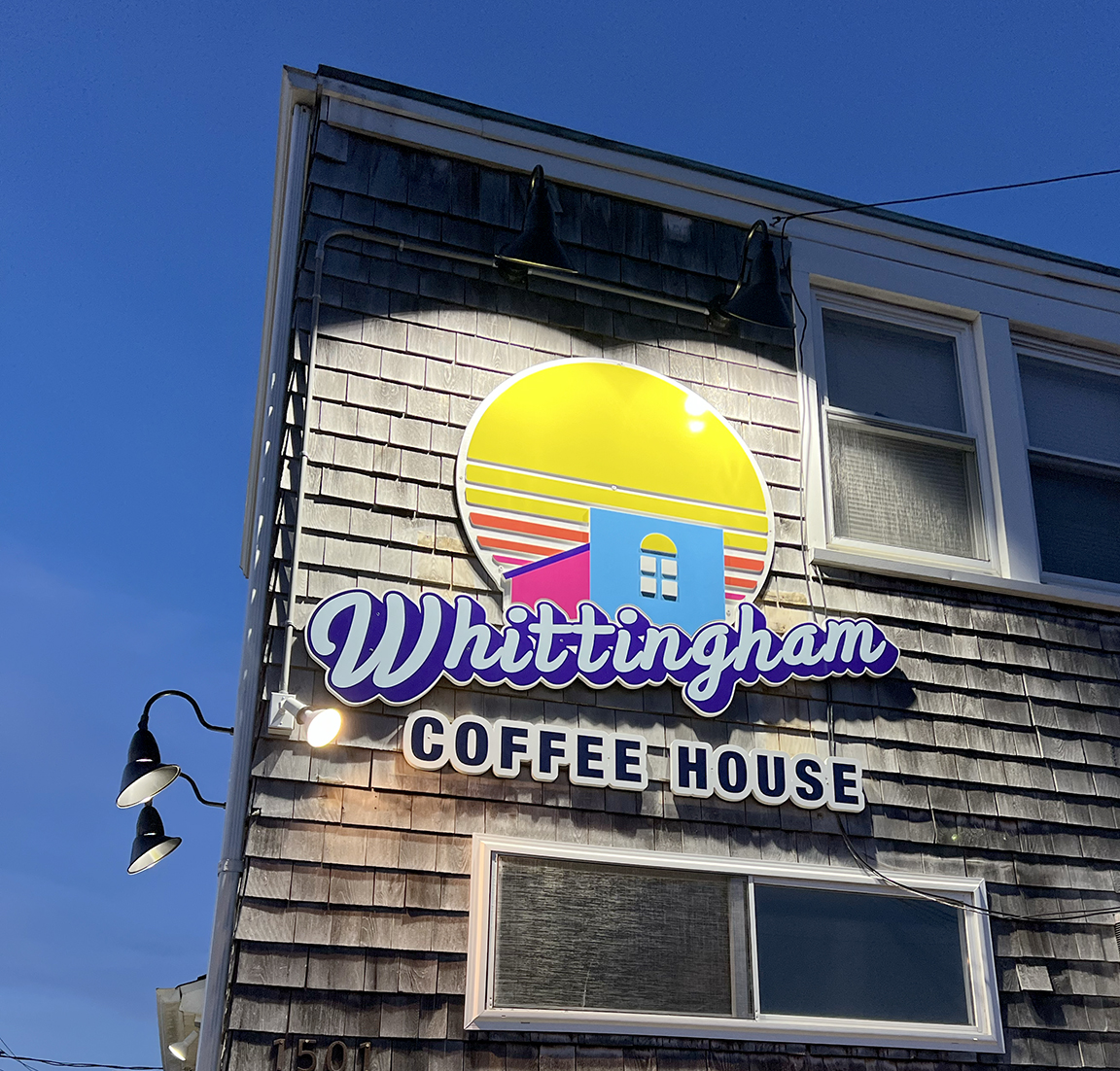 Whittingham Coffee House dimensional sign illuminated at night in Beach Haven, New Jersey for dramatic visibility after dark