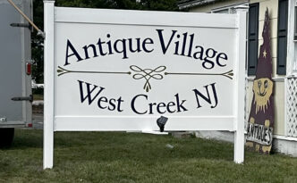 Custom Antique Village roadside business sign in West Creek NJ with durable vinyl graphics on PVC panel, PVC posts and rails designed for the coastal environment