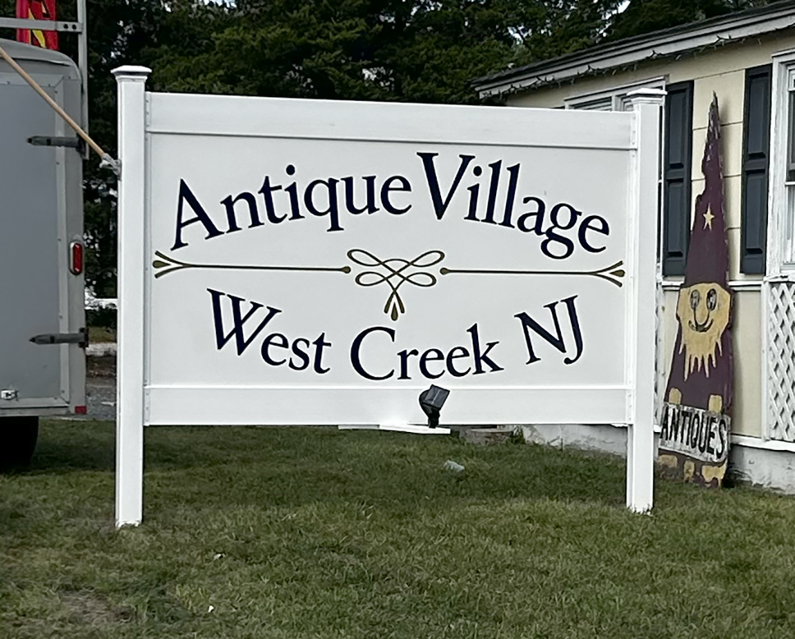 Custom Antique Village roadside business sign in West Creek NJ with durable vinyl graphics on PVC panel, PVC posts and rails designed for the coastal environment