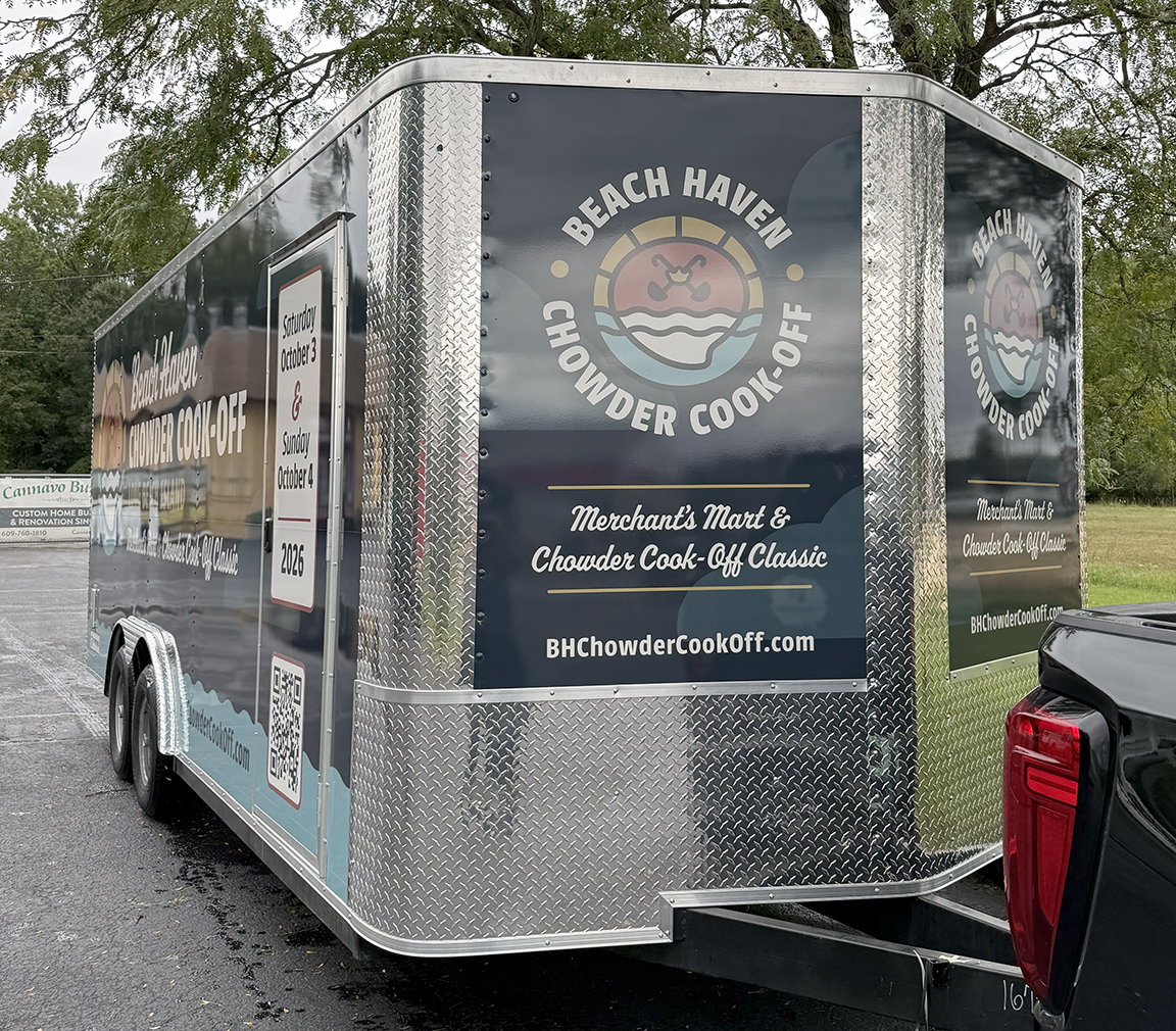 Full side view of custom wrapped event trailer for the Beach Haven Chowder Cook-Off on Long Beach Island featuring event branding, dates, website and QR code