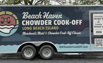 Angled view of the Beach Haven Chowder Cook-Off enclosed trailer wrap with custom event branding on the side and front panels