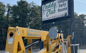 Refurbished roadside sign for Eagleswood Driving Range and Caddy Club in West Creek NJ following new backlit faces and cabinet service