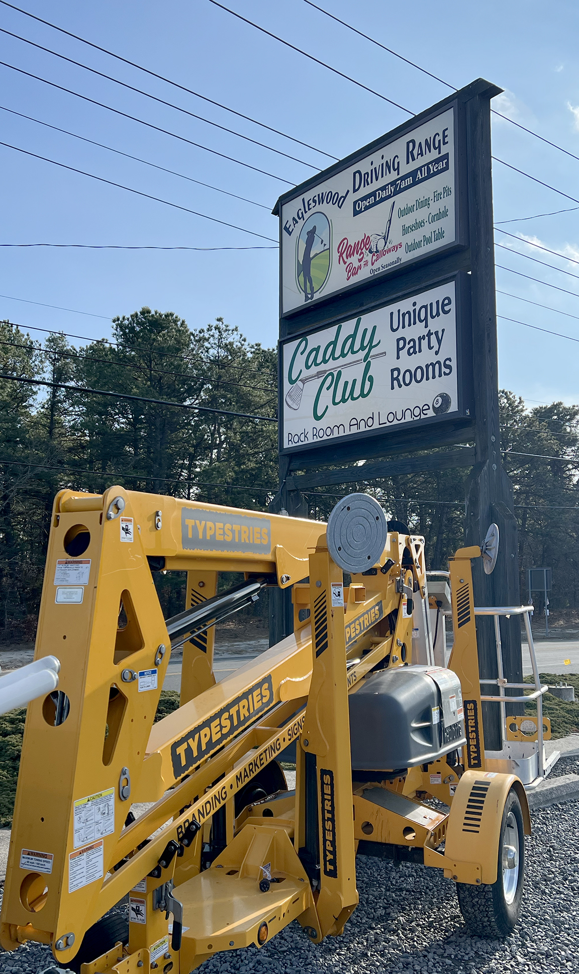 Refurbished roadside sign for Eagleswood Driving Range and Caddy Club in West Creek NJ following new backlit faces and cabinet service