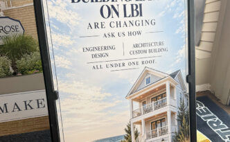 Custom Garabedian Group A-frame event sign promoting changing building laws on Long Beach Island at the Chowderfest Merchants Mart
